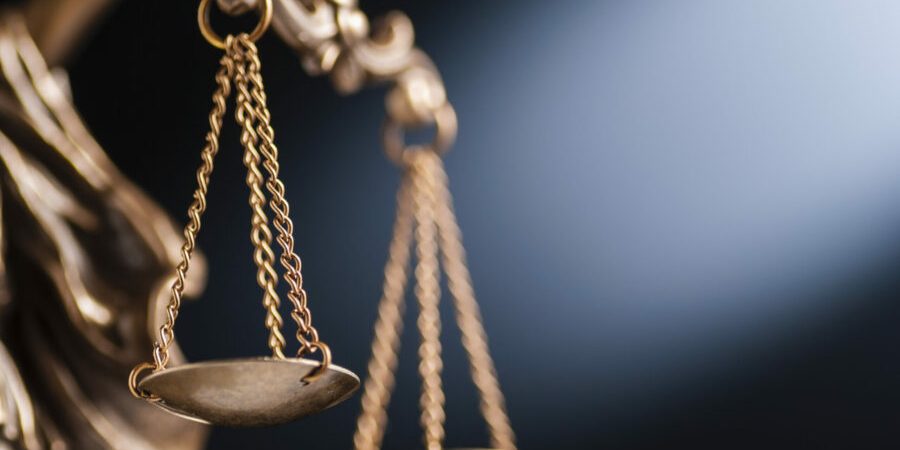 Close up on the scales of justice